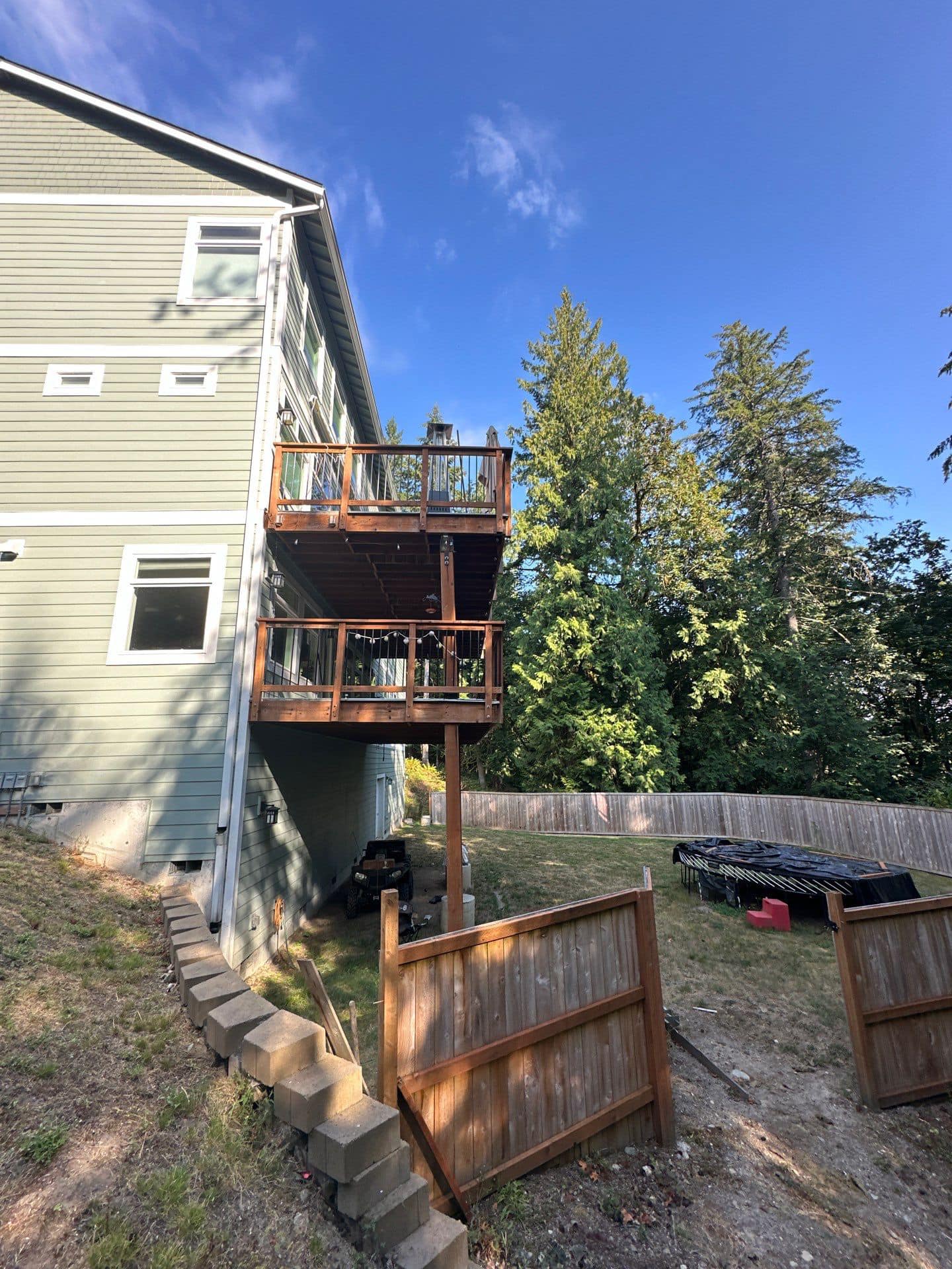 Two-story side balcony attached to a Bellevue home, by Ascend General Contractors